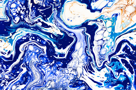 Hand painted background with mixed liquid blue, white, yellow paints. Abstract fluid acrylic painting. Applicable for packaging, invitation, textile, wallpaper, design of different surfacesの写真素材
