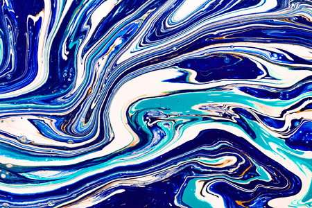 Hand painted background with mixed liquid blue, white, yellow paints. Abstract fluid acrylic painting. Applicable for packaging, invitation, textile, wallpaper, design of different surfacesの写真素材