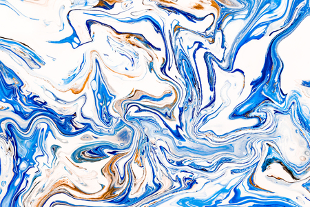 Hand painted background with mixed liquid blue, white, yellow paints. Abstract fluid acrylic painting. Applicable for packaging, invitation, textile, wallpaper, design of different surfacesの写真素材