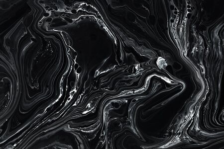 Abstract black marble texture background. Oil, acrylic paint mix pattern. Black and white minimalist wallpaper. Luxury stone material tile. Natural mineral, granite modern designの写真素材