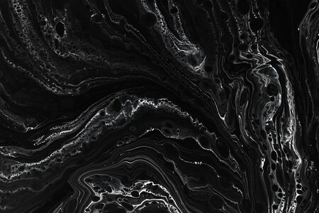 Abstract black marble texture background. Oil, acrylic paint mix pattern. Black and white minimalist wallpaper. Luxury stone material tile. Natural mineral, granite modern designの写真素材