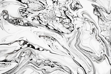 Abstract ink fluid marbled texture. Luxurious granite, marble mineral pattern wallpaper. Black and white minimalist liquid, fluid art backdrop. Oil, paint mix resin artworkの写真素材