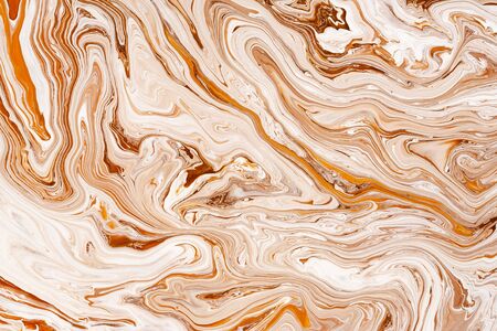 Caramel, cream dynamic and fluid raster texture. Abstract acrylic paints mixture color background. Dyeing, liquid flow effect modern design. Orange, rustic and white pigments, watercolor wallpaperの写真素材
