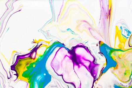 Acrylic paint waves abstract background. Rainbow marble texture. Oil paint liquid flow colorful wallpaper. Creative violet, yellow, blue fluid effect backdrop. Multicolor watercolor, resin art patternの写真素材