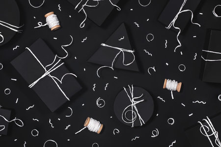 Festive presents and confetti top view raster realistic backdrop. Minimalistic New Year gift boxes...