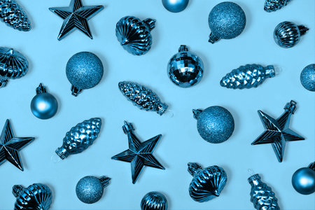 Creative winter composition with christmas decorations. Festive background with new year b lls, cone...
