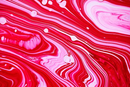 Bright magenta pink and white marbling raster background. Colorful liquid stripy minimalistic trendy paint texture. Rose red abstract fluid art. Acrylic and oil flow modern creative backdropの写真素材