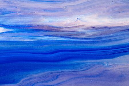 Fluid art texture. Abstract backdrop with mixing paint effect. Liquid acrylic artwork with beautiful mixed paints. Can be used for interior poster. Blue, blue and white overflowing colorsの写真素材