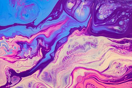 Fluid art texture. Abstract backdrop with iridescent paint effect. Liquid acrylic artwork with flows and splashes. Mixed paints for website background. Purple, pink, blue and white overflowing colorsの写真素材