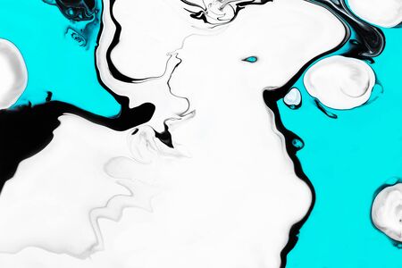 Fluid art texture. Abstract background with iridescent paint effect. Liquid acrylic artwork with flows and splashes. Mixed paints for baner or wallpaper. Black, white and azure overflowing colorsの写真素材