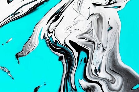 Fluid art texture. Abstract background with iridescent paint effect. Liquid acrylic picture with flows and splashes. Mixed paints for website background. Black, white and azure overflowing colorsの写真素材