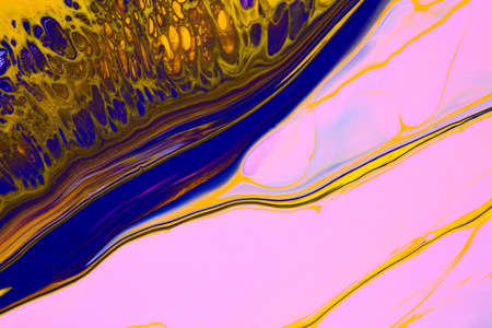 Fluid art texture. Backdrop with abstract iridescent paint effect. Liquid acrylic picture with colorful mixed paints. Can be used for background or poster. Pink, blue and yellow overflowing colorsの写真素材