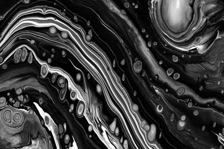 Fluid art texture. Background with abstract mixing paint effect. Liquid acrylic picture with flows and splashes. Mixed paints for website background. Black and white overflowing colorsの写真素材
