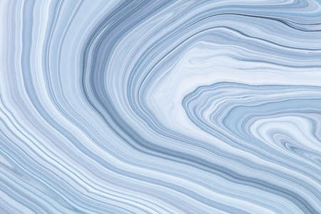 Fluid art texture. Abstract backdrop with mixing paint effect. Liquid acrylic picture that flows and splashes. Mixed paints for baner or wallpaper. Blue and gray overflowing colorsの写真素材