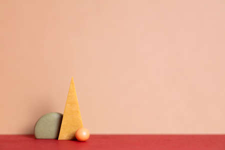 Geometry set abstract composition. Simple figures on red and beige background. Harmony concept with colorful shapes. Minimal construction with geometric formsの写真素材