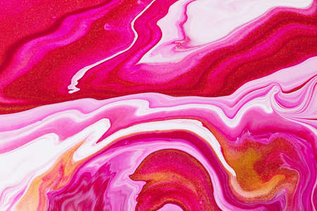 Fluid art texture. Background with abstract swirling paint effect. Liquid acrylic picture with flows and splashes. Mixed paints for interior poster. Golden, white and red overflowing colorsの写真素材