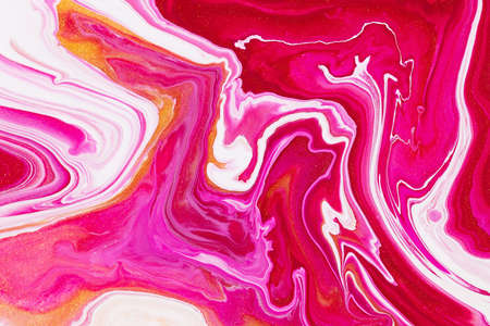 Fluid art texture. Background with abstract swirling paint effect. Liquid acrylic artwork with trendy mixed paints. Can be used for website background. Golden, white and red overflowing colorsの写真素材