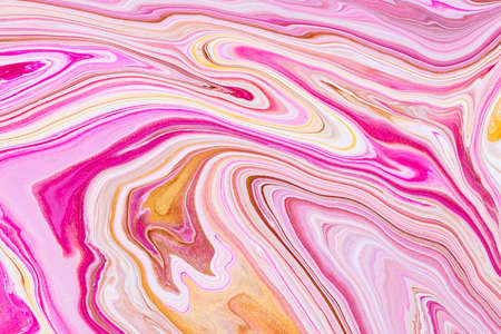 Fluid art texture. Abstract background with iridescent paint effect. Liquid acrylic picture with trendy mixed paints. Can be used for website background. Golden, white and coral overflowing colorsの写真素材