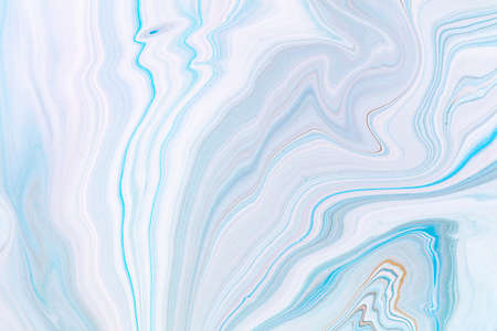 Fluid art texture. Background with abstract iridescent paint effect. Liquid acrylic picture with beautiful mixed paints. Can be used for interior poster. Blue, azure and orange overflowing colors.の写真素材