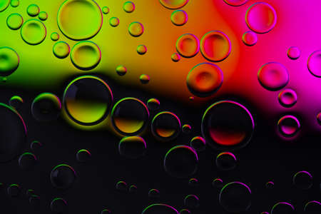 Creative neon background with drops. Glowing abstract backdrop with vibrant gradients on bubbles. Multicolor overflowing picture.の写真素材