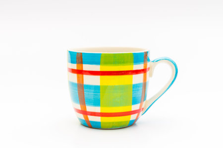 black coffee in color coffee mug on white backgroundの写真素材