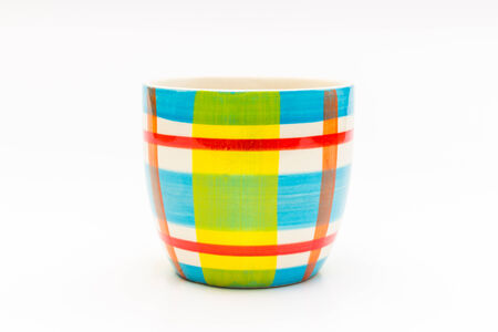 black coffee in color coffee mug on white backgroundの写真素材