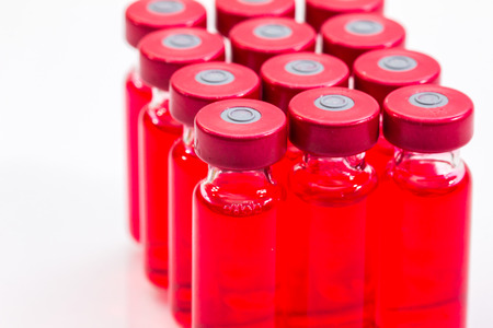 the vaccine and a hypodermic syringe must use a pairの写真素材