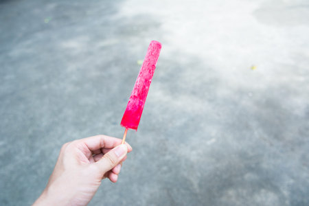 Traditional Thai Popsicle Maker made by using juice pour to stainless tube and soak into a tank then rotate the top,this agitates the ice and settles the tubesの写真素材