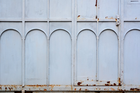 Old metal door rusty corroded texture backgroundの写真素材