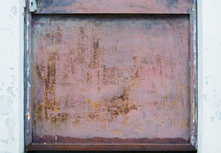 Old metal door rusty corroded texture backgroundの写真素材