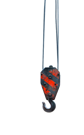 Black and red cranes hooks hanging on steel ropes isolated on white backgroundの写真素材