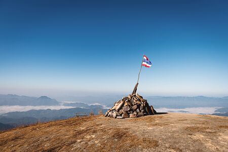 Thai flag on the top of the hill at Doi Tu Lay (Mon Tu Lay) , Tak province Thailandの写真素材