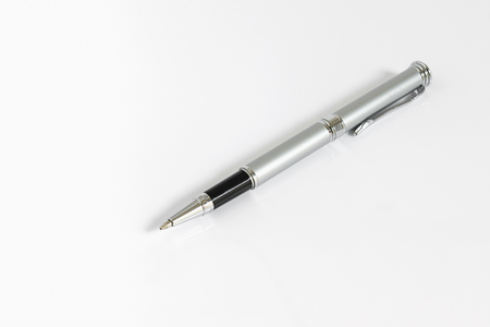 Silver metal pen isolated on white backgroundの写真素材
