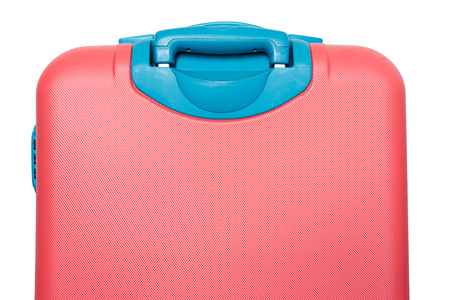 Orange travel plastic suitcase with wheels realistic on white backgroundの写真素材