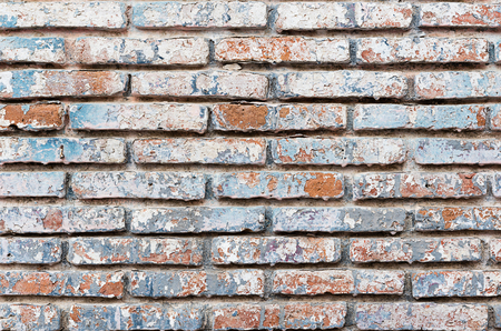Old brick wall in a background image, colorful brick wall backgroundの写真素材