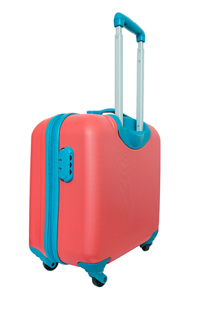 Orange travel plastic suitcase with wheels realistic on white backgroundの写真素材