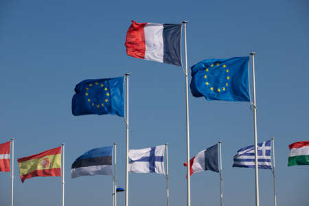 Flags of the European Union, France and Spain waving in the windの写真素材