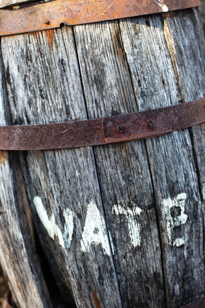 Old wooden barrel with the word beer on it. Selective focus.の写真素材