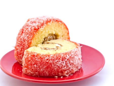 Strawberry Yam Roll on the red dishの写真素材