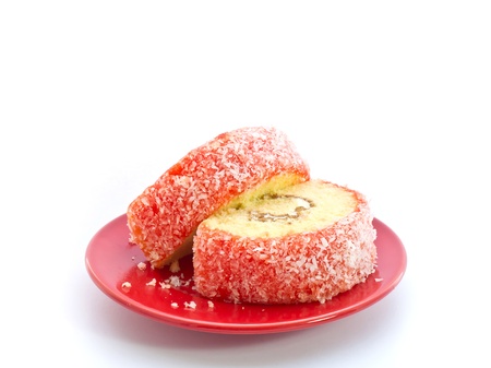 Strawberry Yam Roll on the red dishの写真素材