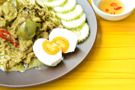 Green curry with rice and boil eggの写真素材