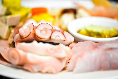 Octopus Sashimi with sauceの写真素材
