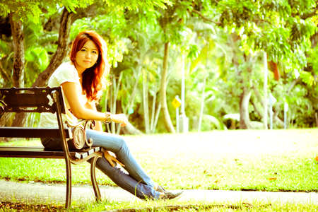Beautiful woman relax in the gardenの写真素材