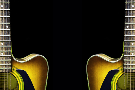 Acoustic guitar background with black spaceの写真素材