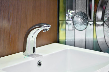 Modern faucet and wash basin in luxury bathroomの写真素材