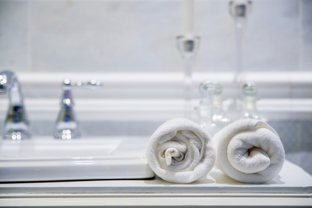 wash basin and towel in luxury bathroomの写真素材