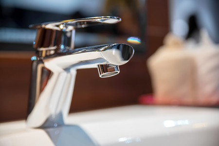 wash basin and faucet in luxury bathroomの写真素材