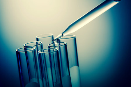 Dropping liquid to test tubes