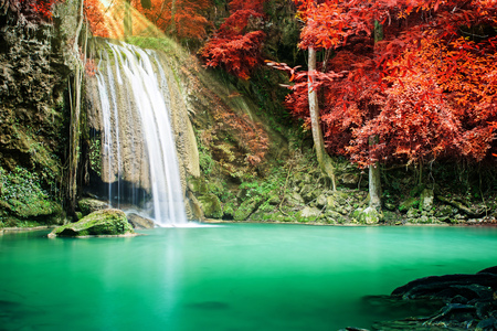 Beautiful waterfall in autumn forestの写真素材