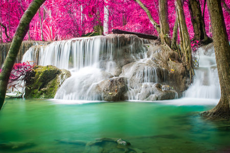 Beautiful waterfall in autumn forestの写真素材